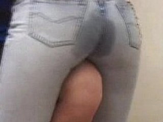 Hot girl getting wet in those tight jeans